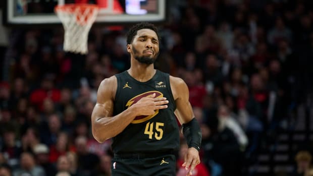Nov 15, 2023; Portland, Oregon, USA; Cleveland Cavaliers guard Donovan Mitchell (45) reacts after scoring a three point basket during the second half against the Portland Trail Blazers at Moda Center. Mandatory Credit: Troy Wayrynen-USA TODAY Sports